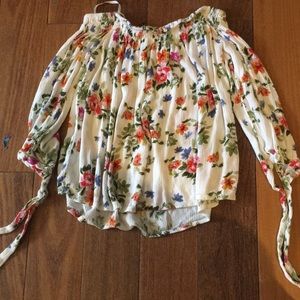 Off the shoulder floral pattern shirt